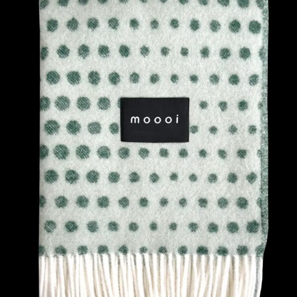 Statement home accessory – Moooi blanket with blooming seadragon motif.