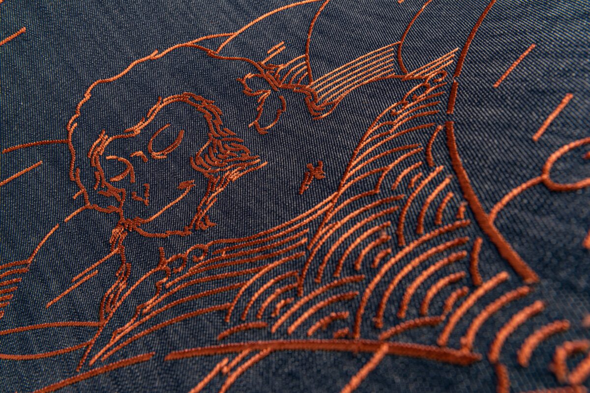 “Indigo Macaque wallcovering by Moooi showcasing playful monkey motif”