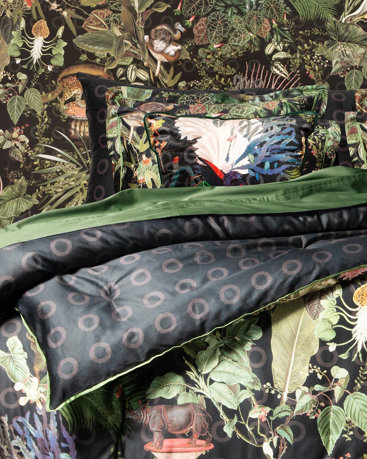 Menagerie of Extinct Animals Comforter by Moooi, with detailed artwork of extinct animals and a stylish circle pattern reverse, crafted in high-quality cotton sateen. Visit Italcasa Design, Troy, Michigan to view this piece.