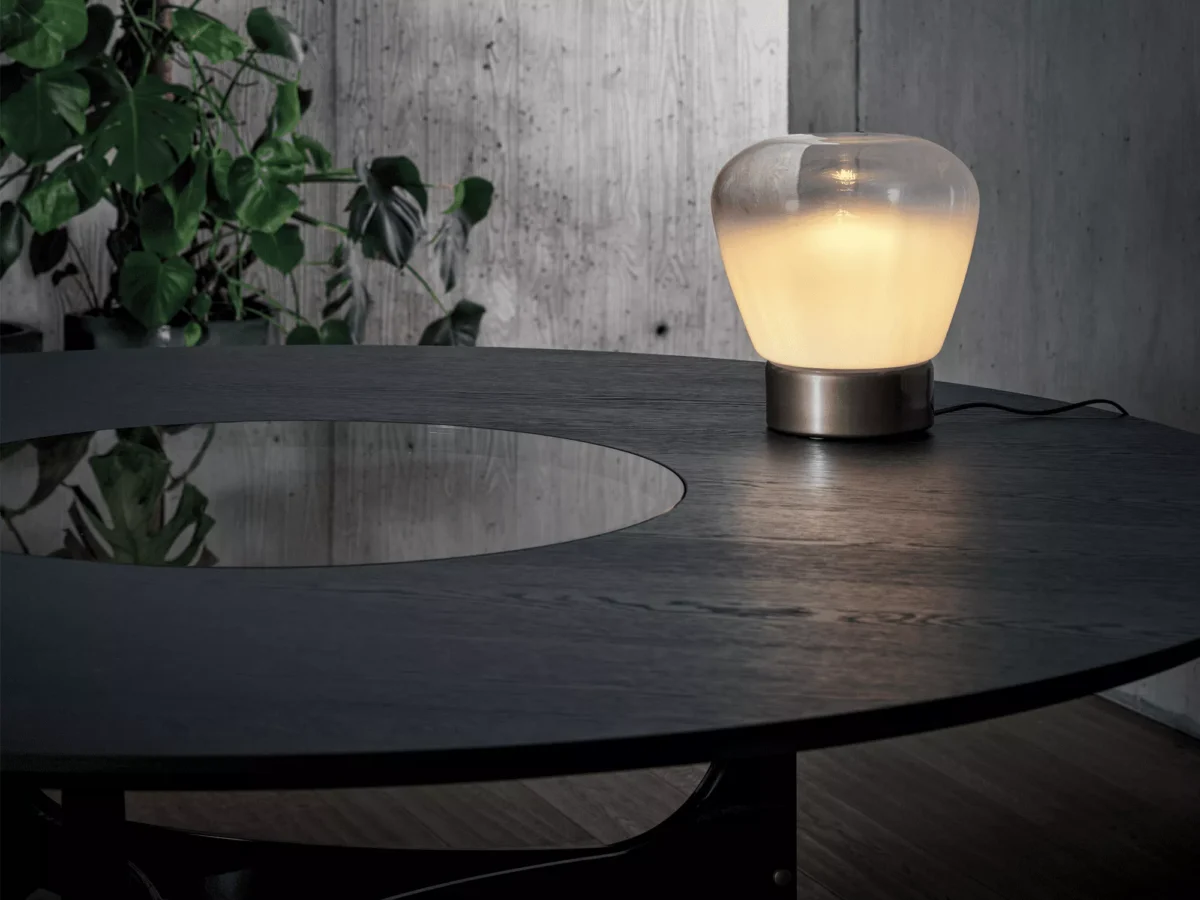 Elegant Imperial Round table by Bontempi featuring a dove‑grey velvet‑matt anti‑scratch glass top and aged‑brass two‑ring metal frame.