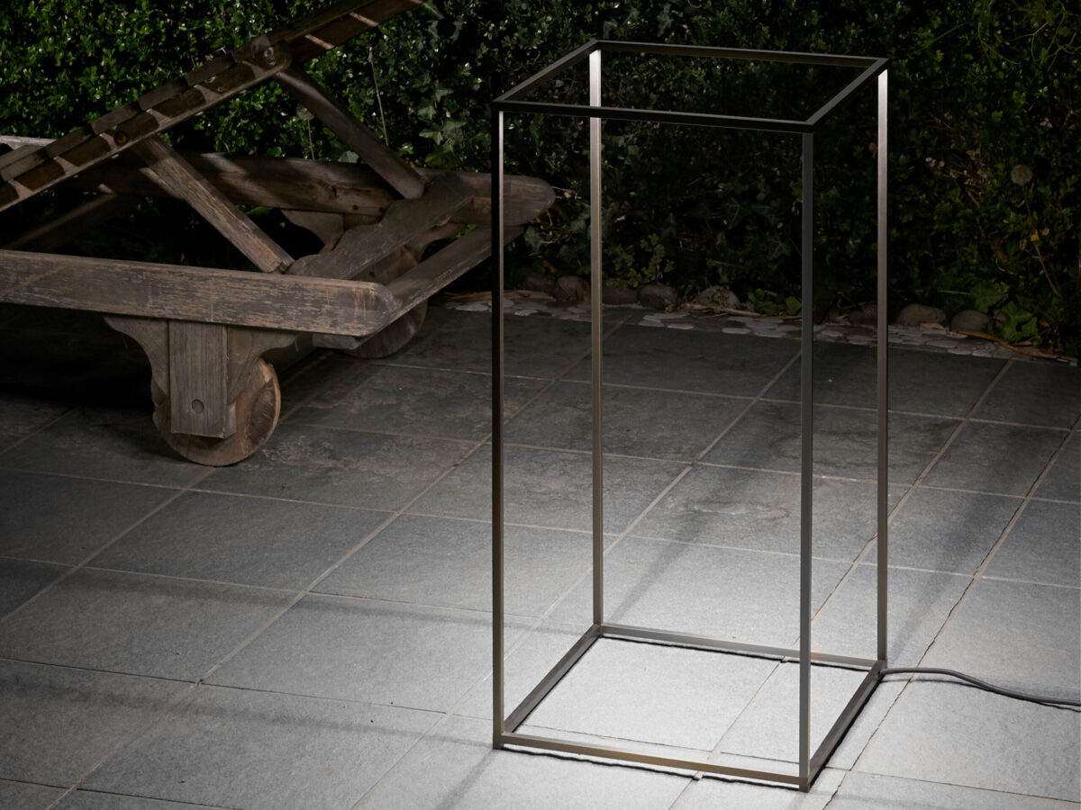 Sleek and lightweight Ipnos Outdoor lamp by Flos, ideal for patios and terraces with modern styling.