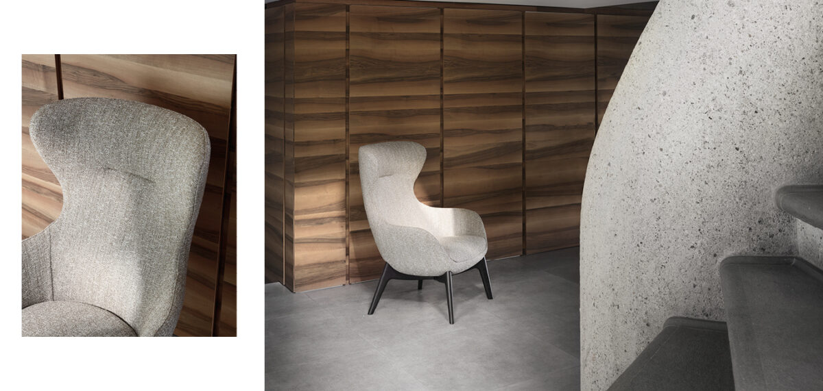 Iseo armchair by Nicoline Italia with high-back design and wenge wood base, perfect for modern interiors in Royal Oak, Michigan.