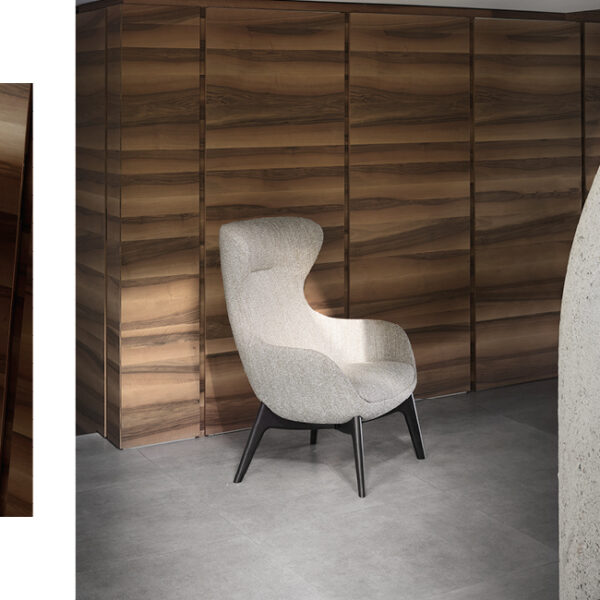 Iseo armchair by Nicoline Italia with high-back design and wenge wood base, perfect for modern interiors in Royal Oak, Michigan.
