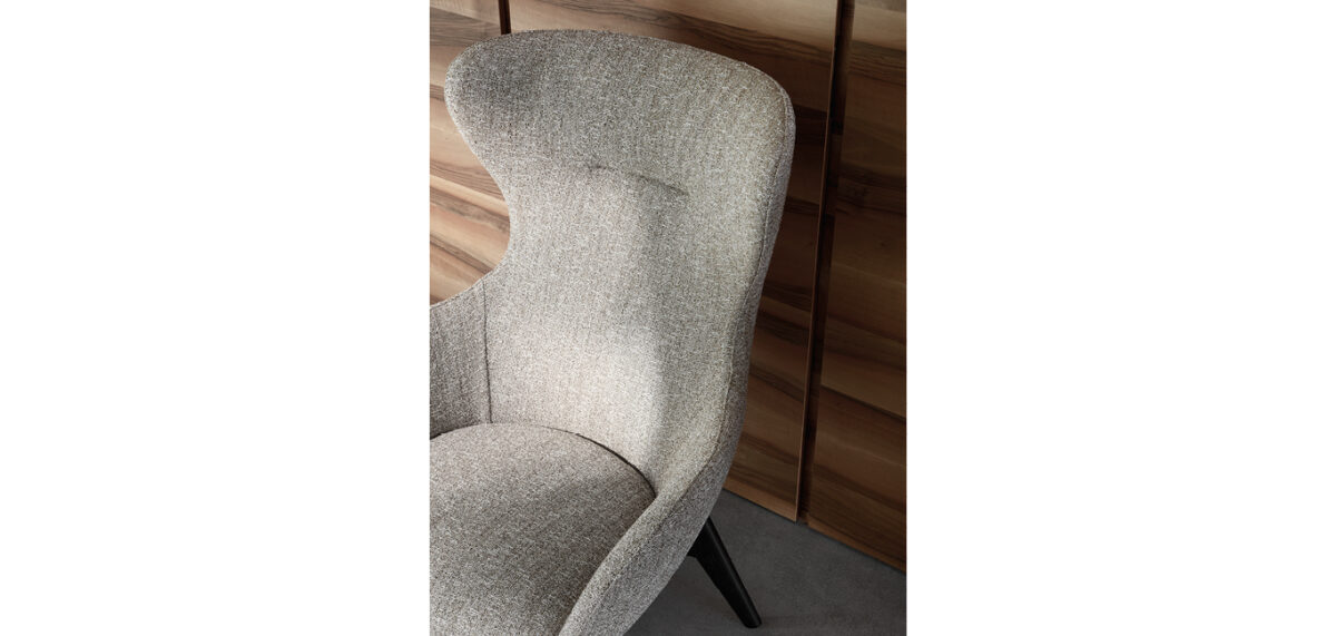 Iseo armchair by Nicoline Italia with high-back design and wenge wood base, perfect for modern interiors in Royal Oak, Michigan.
