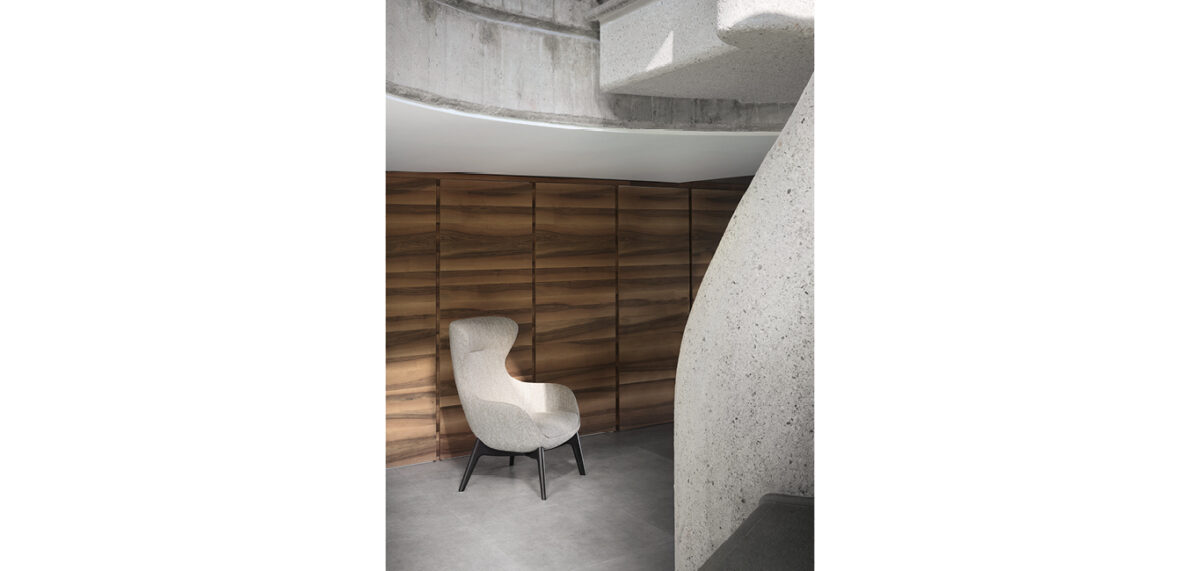 Iseo armchair by Nicoline Italia with high-back design and wenge wood base, perfect for modern interiors in Royal Oak, Michigan.