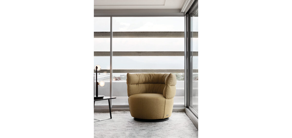 Julie armchair by Nicoline Italia with plush padding and elegant stitching, perfect for modern interiors in Royal Oak, Michigan.