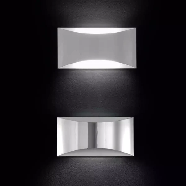 “Kelly by Oluce contemporary designer lighting – stylish table lamp featuring smooth glass globe and polished metal accents”