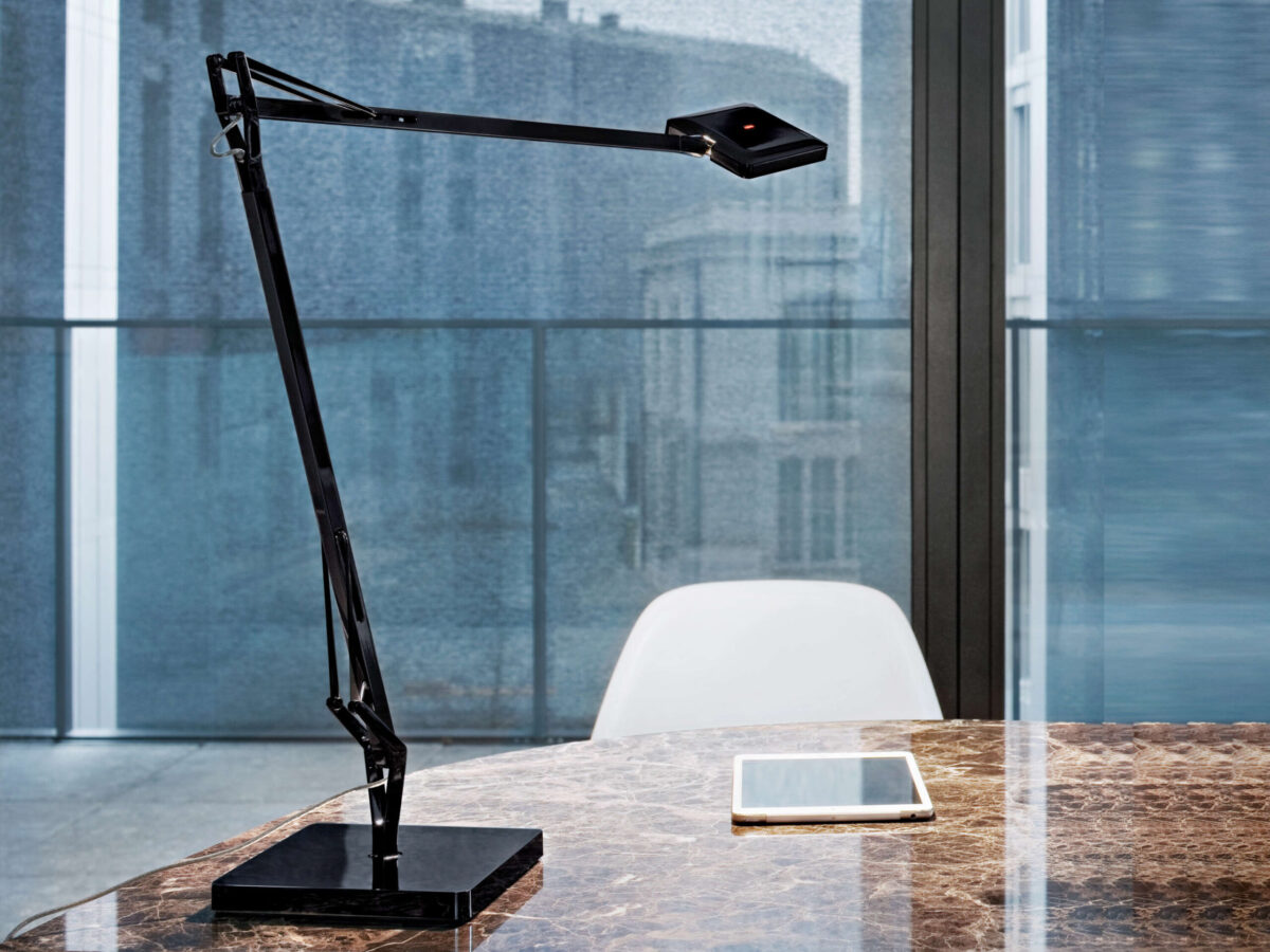 Kelvin Edge Base lamp by Flos side profile highlighting square-edge LED head and balanced steel base in a Troy Michigan setting
