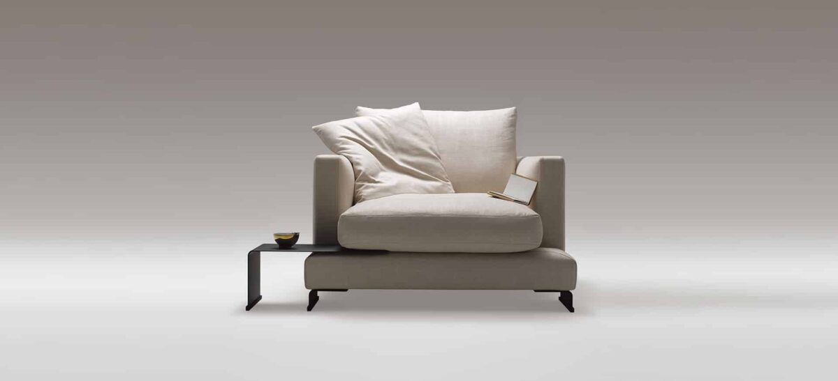 Deep-seated lounge chair with soft cushions