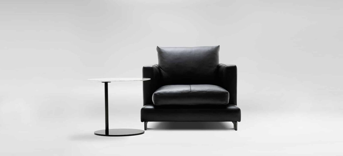 Compact lounge chair with plush cushions