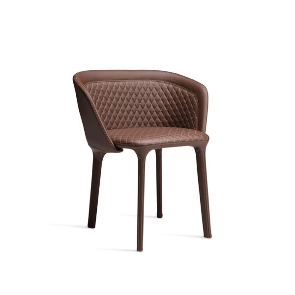"Lepel Quilted Armchair by Casamania upholstered in soft grey fabric with diamond-pattern quilting and sleek metal legs."