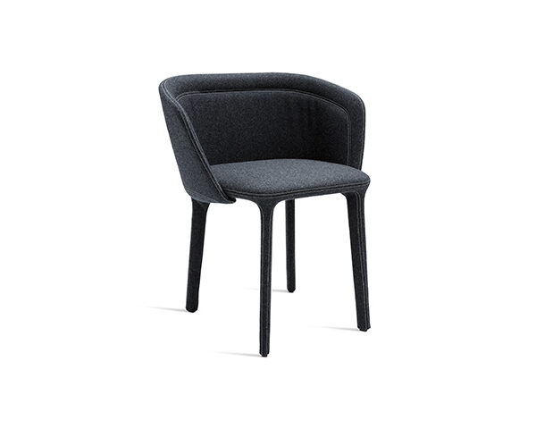 "Spoon Plain Armchair by Casamania in soft beige upholstery with smooth, rounded curves and wooden legs."
