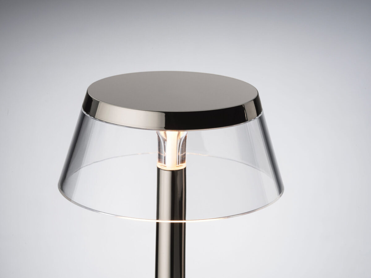 Bon Jour Unplugged in a matte white finish by Flos, combining classic shape with modern technology.