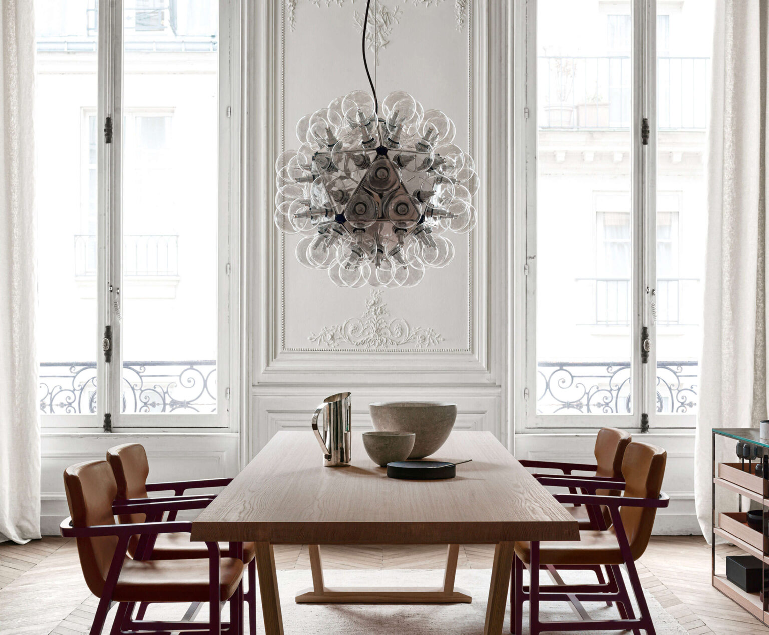 Suspended Taraxacum 88 fixture with black cable and steel canopy, designed by Achille Castiglioni in 1988.