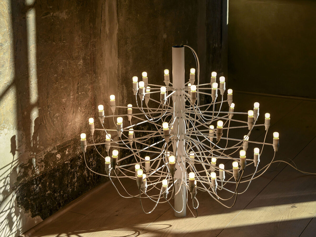 Suspended 2097/50 light fixture by Flos designed by Gino Sarfatti, featuring radiant industrial elegance.