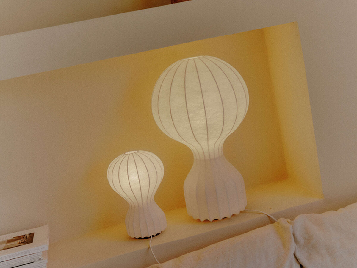 Gatto Piccolo Table Lamp by Flos rear angle emphasizing textured cocoon resin finish and discreet dimmer on cable in a Royal Oak Michigan display