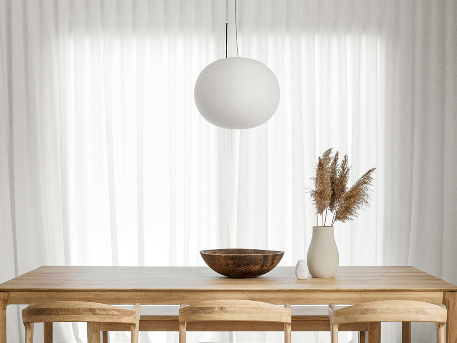 Close-up of the etched opaline glass diffuser revealing delicate texture and uniform translucency.