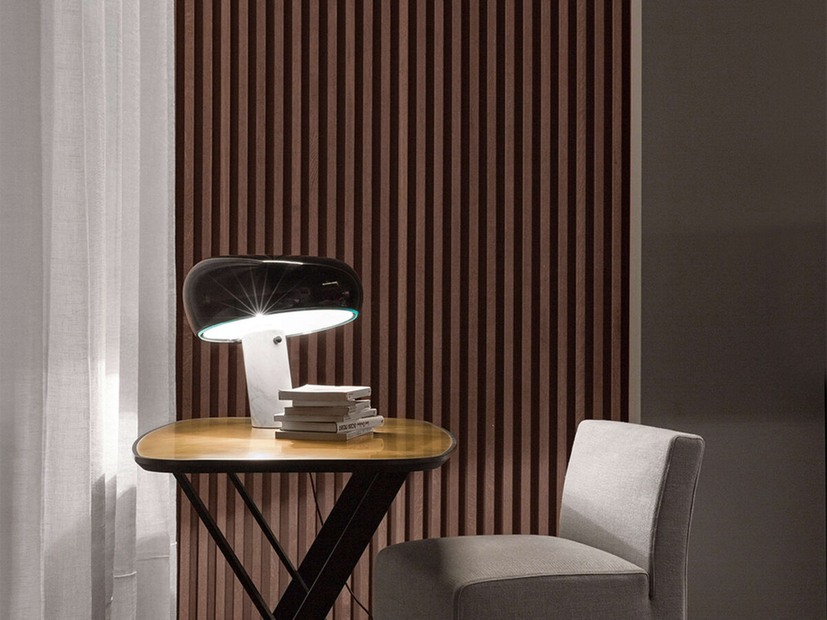Snoopy Table Lamp by Flos side profile highlighting the thick glass disc and enamel reflector in a Troy Michigan setting