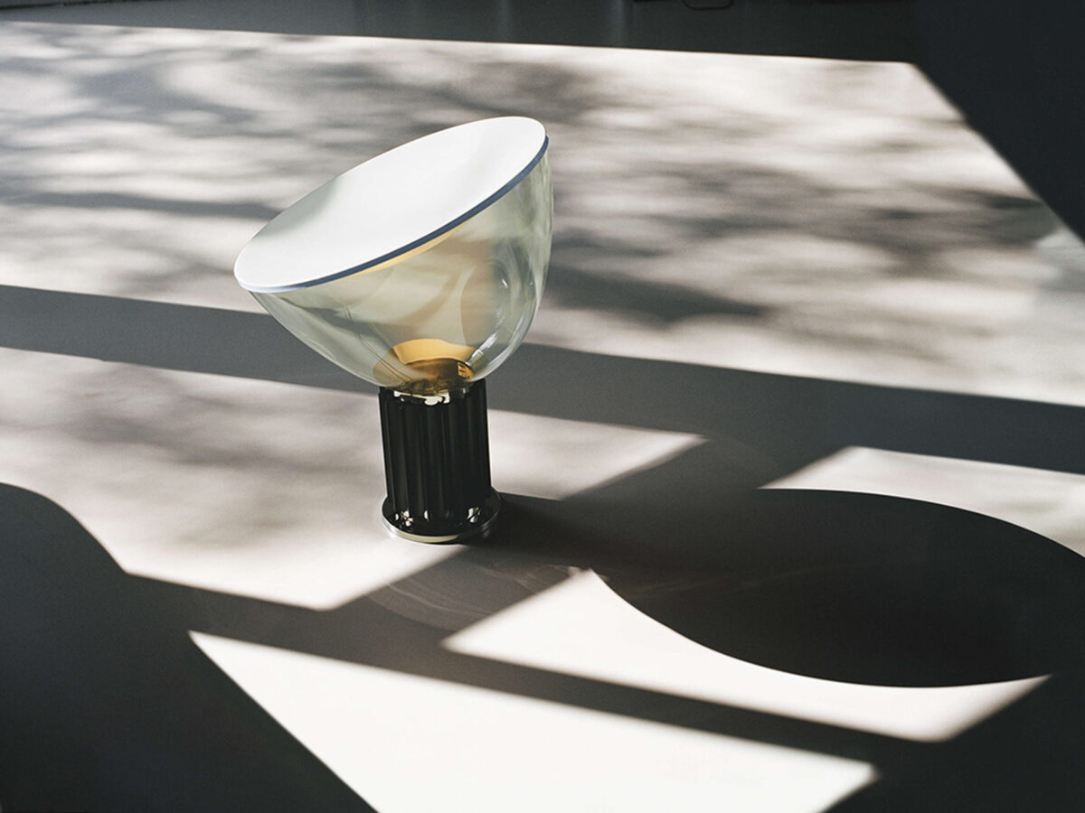 Taccia Table Lamp by Flos close-up of the matte white concave reflector and rotatable diffuser for directed ambient light at the Michigan Design Center