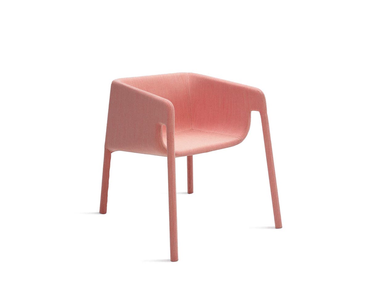 "Lobby seating collection by Casamania featuring modular sofas in soft pastel upholstery with rounded edges."