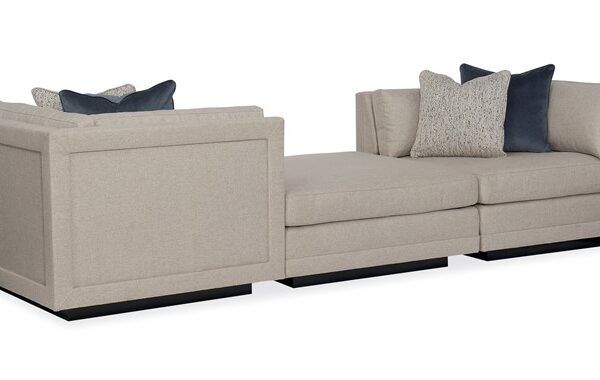 Caracole Fusion 3 Piece Sectional featuring a menswear-inspired textured tweed pattern, recessed Simply Black wood plinth base, cut-out frame detail, and contrasting accent pillows in gunmetal velvet and black-and-white herringbone stitch.