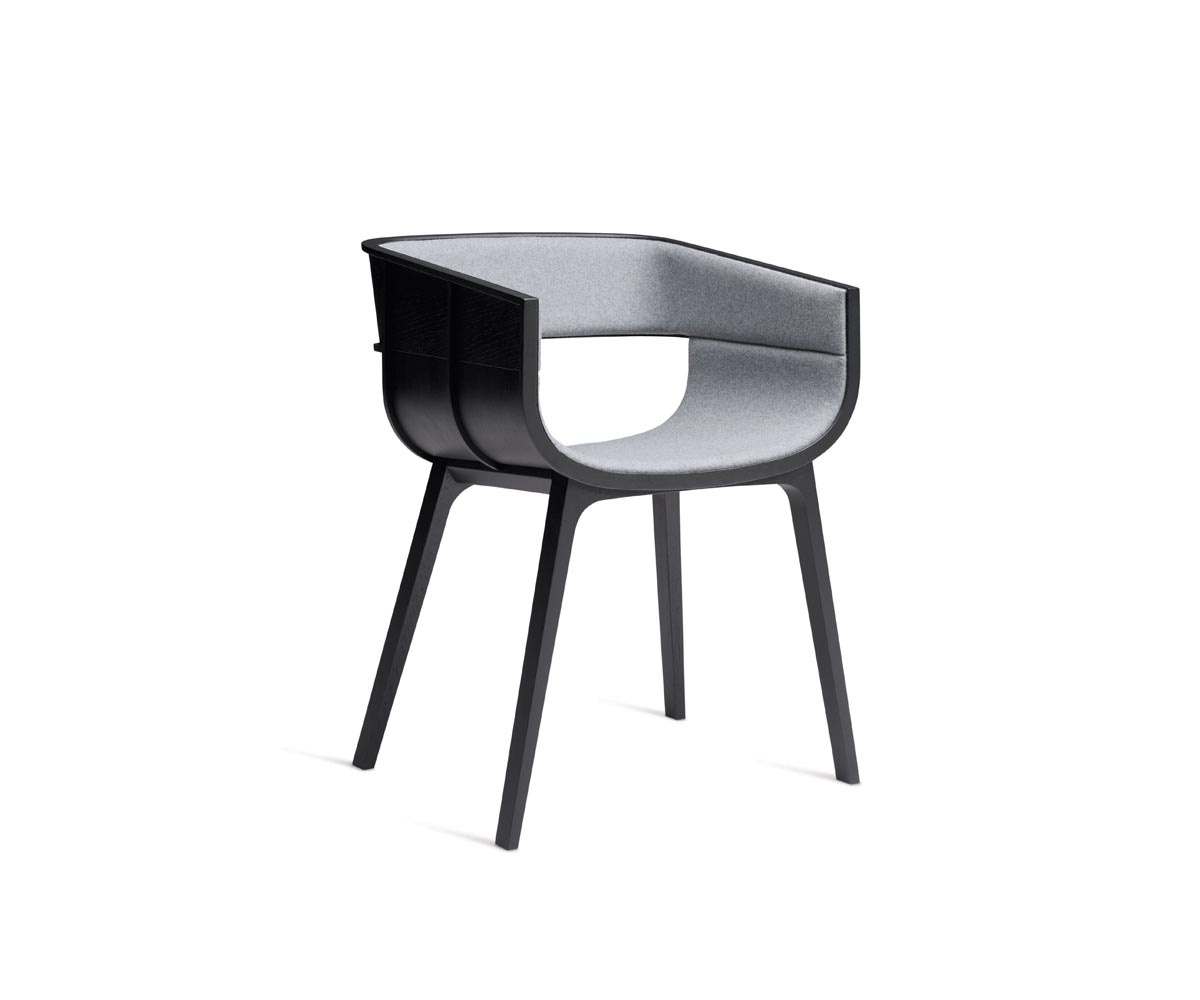 "Maritime Upholstered Chair by Casamania with a curved wooden frame and padded grey fabric seat."