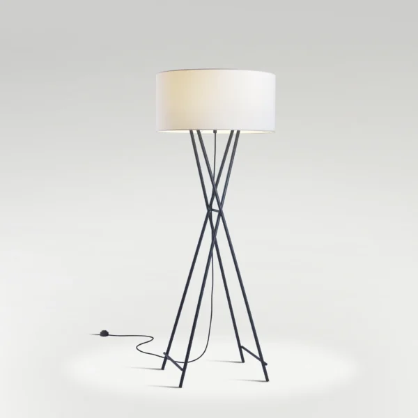 “Cala Metal by Marset floor lamp – sleek black metal tripod with warm fabric shade for ambient lighting”