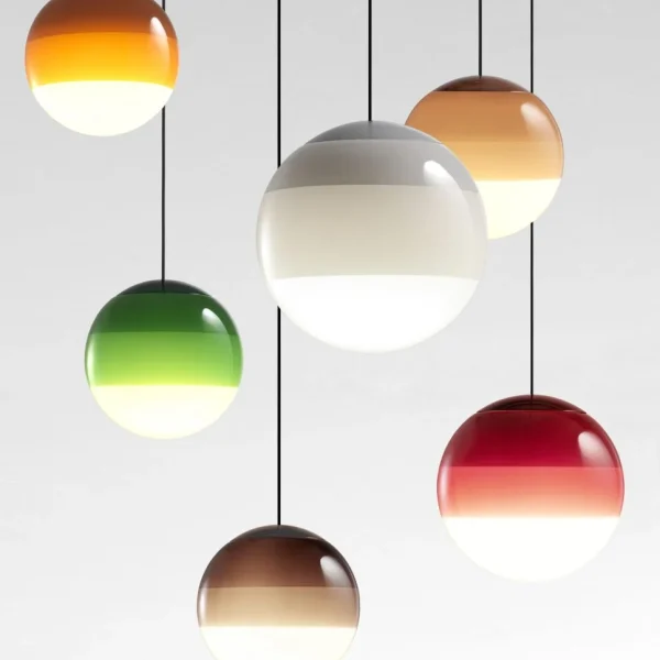 “Sculptural LED lamp Dipping Light by Marset with vibrant dipped glass design”