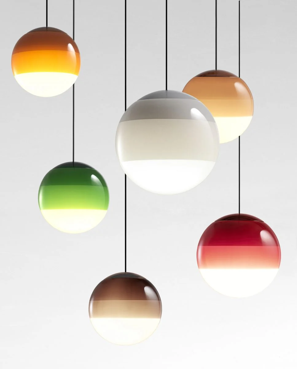 “Sculptural LED lamp Dipping Light by Marset with vibrant dipped glass design”
