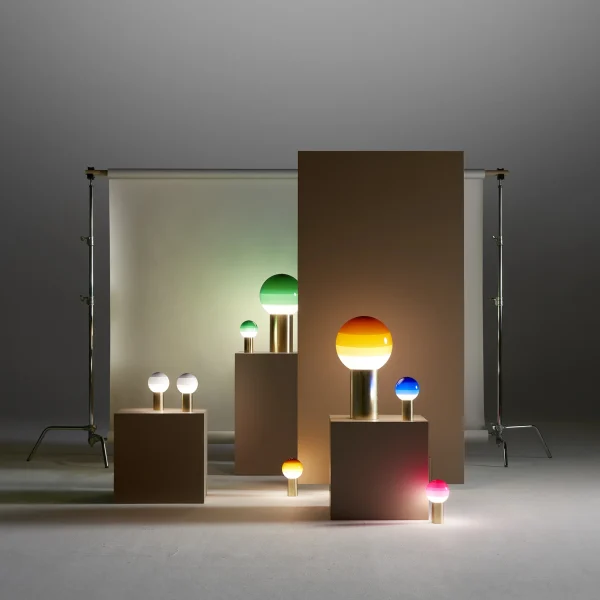 “Modern table light Dipping Light by Marset – colorful artistic lamp with elegant circular silhouette”