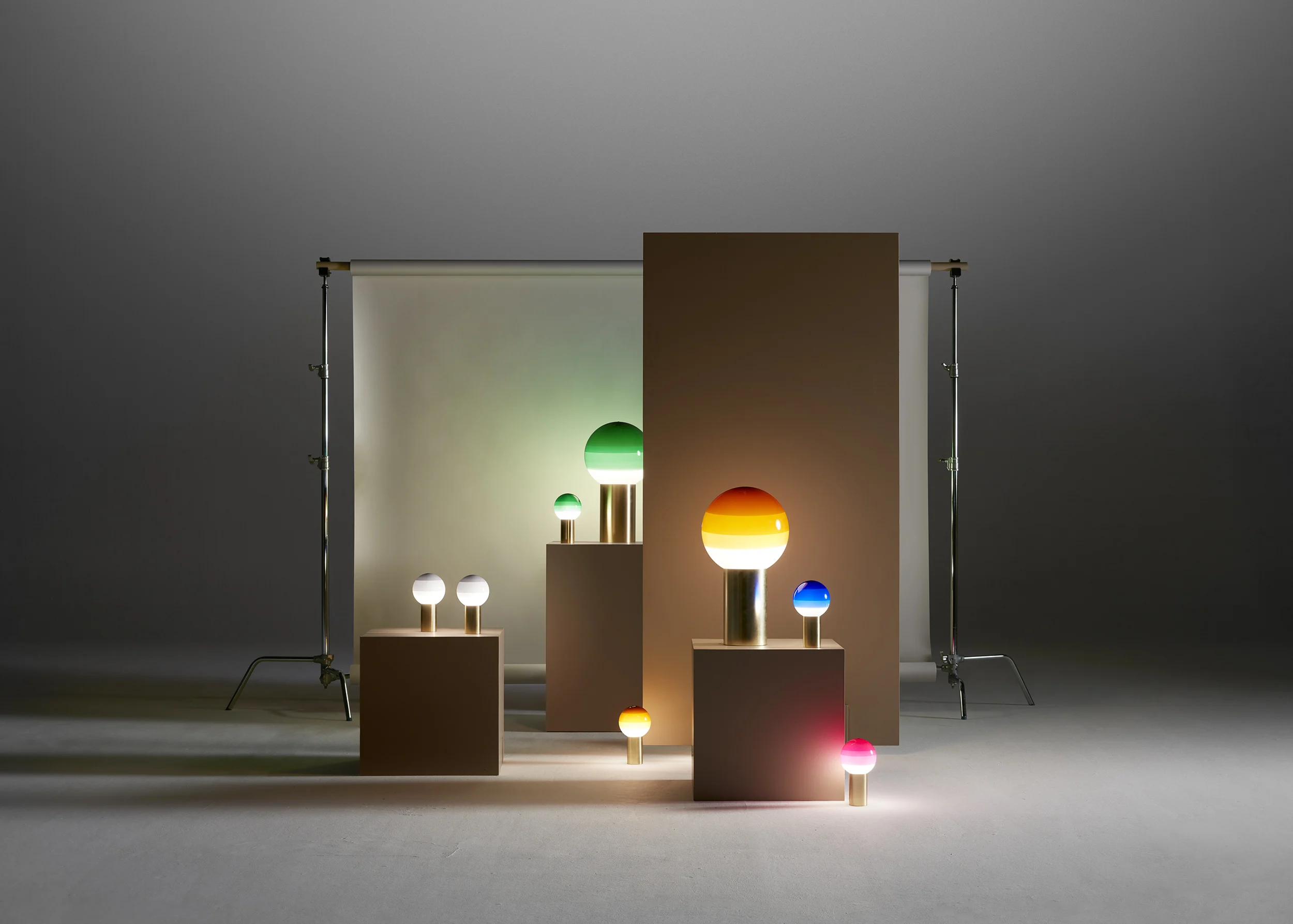 “Modern table light Dipping Light by Marset – colorful artistic lamp with elegant circular silhouette”