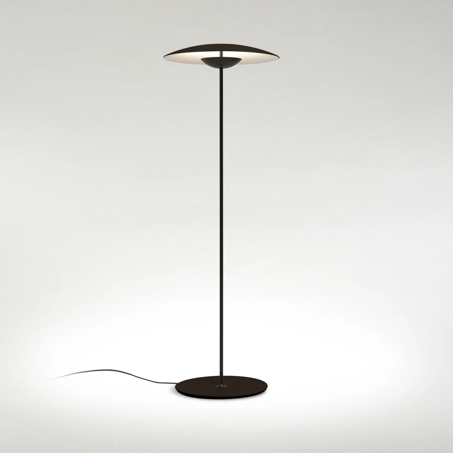 “Modern pendant light Ginger by Marset – layered wooden discs creating soft ambient glow”