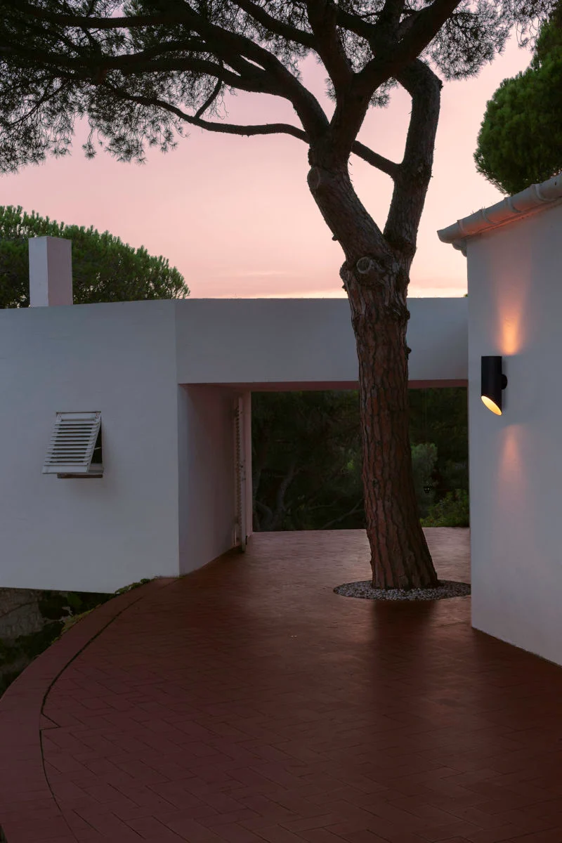 “Elipse by Marset sculptural outdoor lighting – minimalist silhouette with atmospheric illumination”