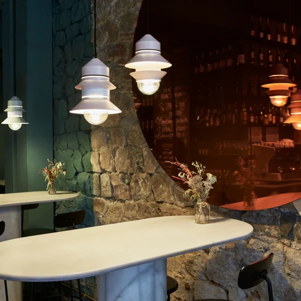 “Versatile Santorini lamp collection by Marset – inspired by fishing‑boat lanterns, offering creative compositions across pendant, wall, ceiling, and floor options”