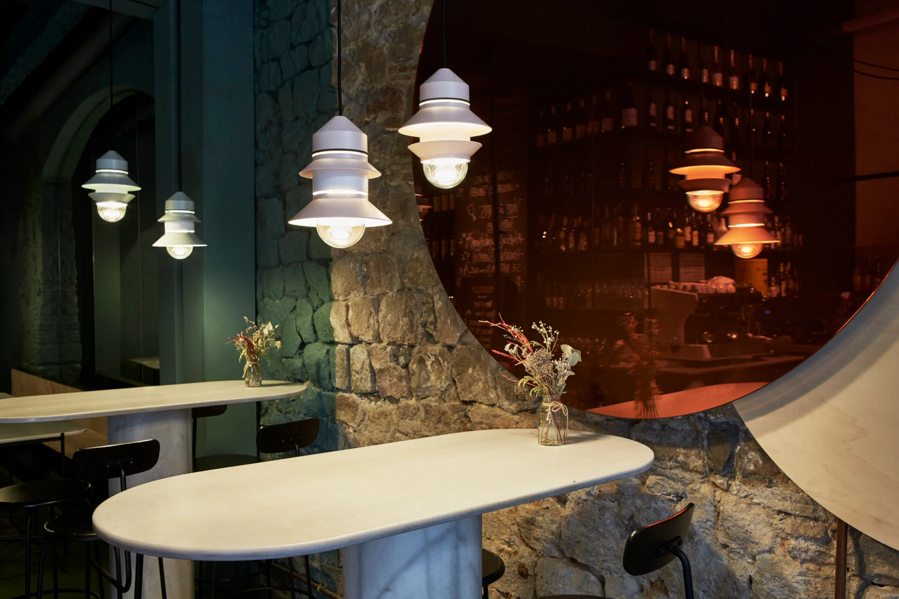 “Versatile Santorini lamp collection by Marset – inspired by fishing‑boat lanterns, offering creative compositions across pendant, wall, ceiling, and floor options”