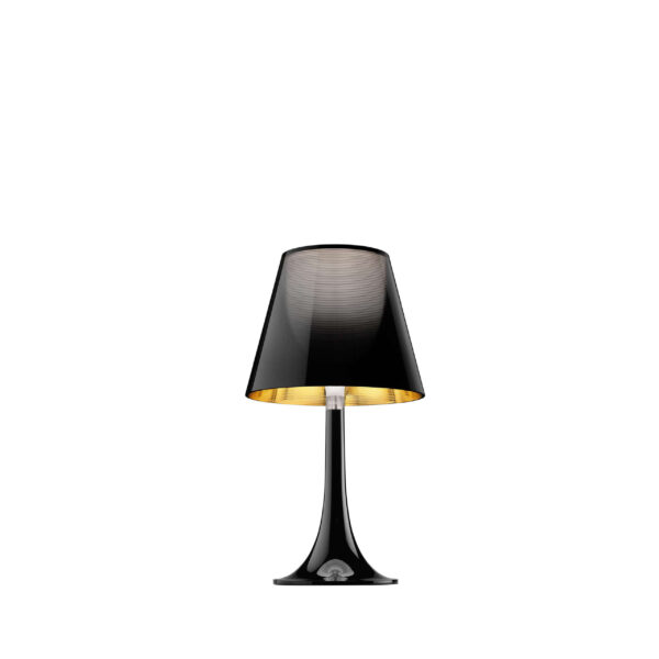 Miss K by Flos, Miss K table lamp by Flos in clear acrylic with a soft inner diffuser, blending classic and contemporary design.