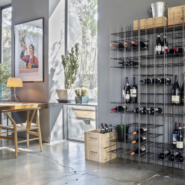“Sleek wine bottle rack WINE METRIC by Mogg – contemporary design combining form and utility”