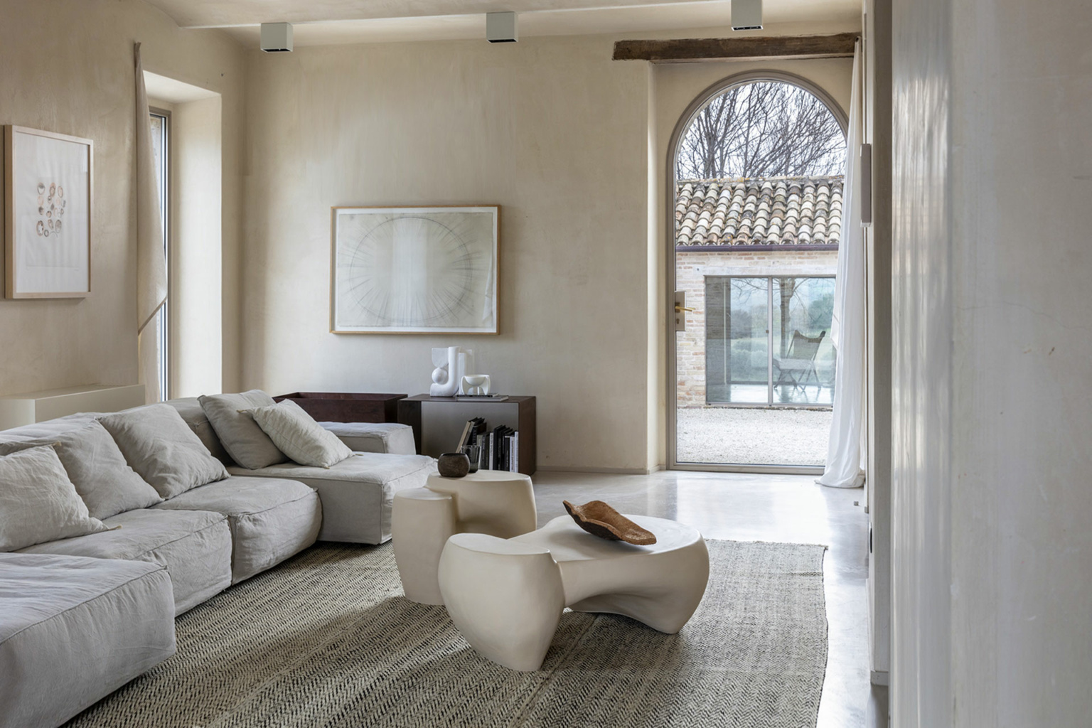 “DUNES by Mogg – sculptural sideboard with wave-like carved wooden doors and minimalist silhouette”