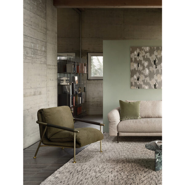 Nicole armchair by Nicoline, featuring a slender metal frame and eco-leather cord armrests, adding modern elegance to interiors in Royal Oak, Michigan.