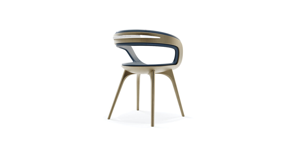 Contemporary Nido Chair by Reflex Angelo in Birmingham, MI – designed with a sculpted shell and legs in satin brass finish, upholstered in luxurious leather, and a polished steel handle by Pininfarina