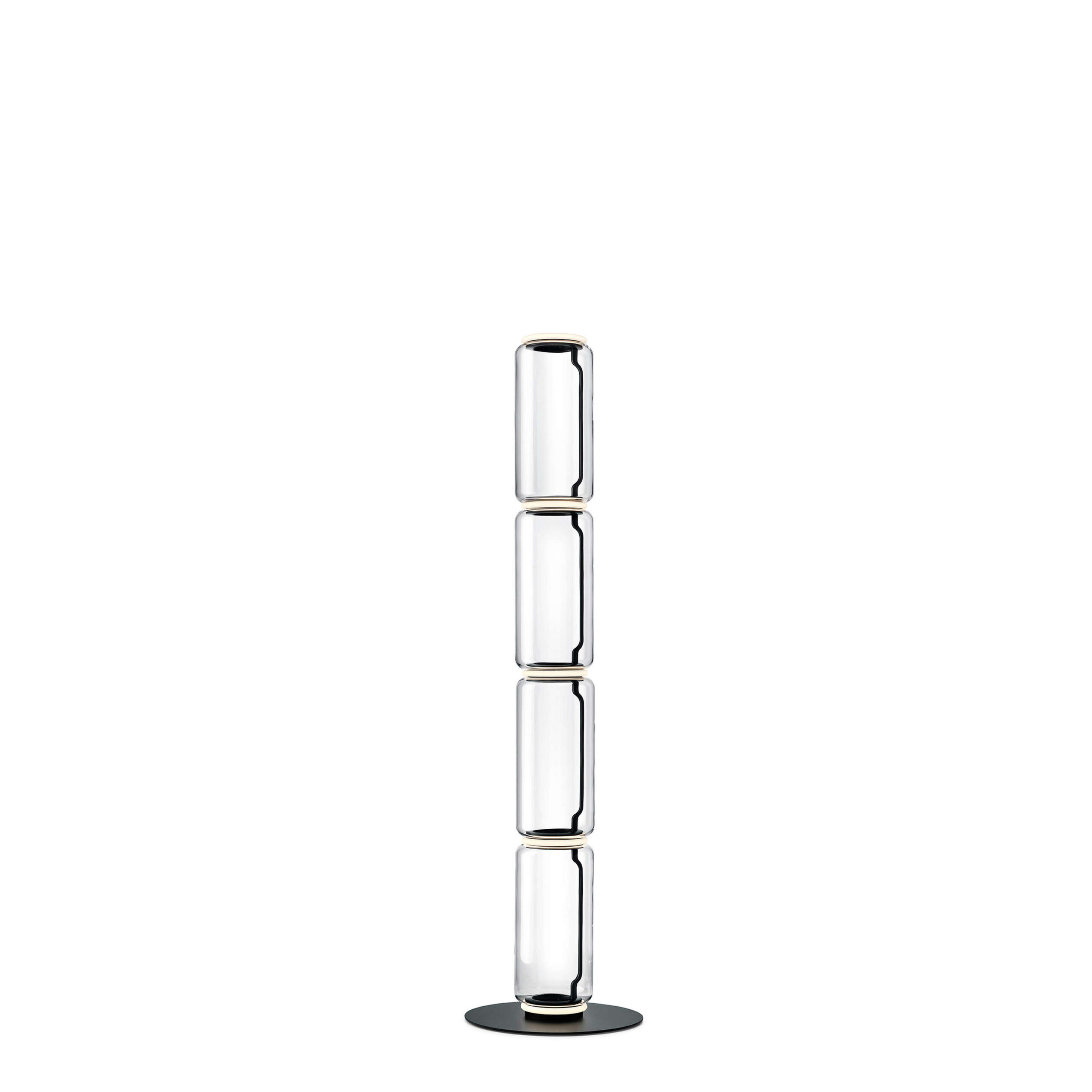 Noctambule Floor 4 High Cylinder Big Base by Flos, Tall floor lamp composed of four transparent blown-glass cylinders stacked vertically on a large black die-cast aluminum base.