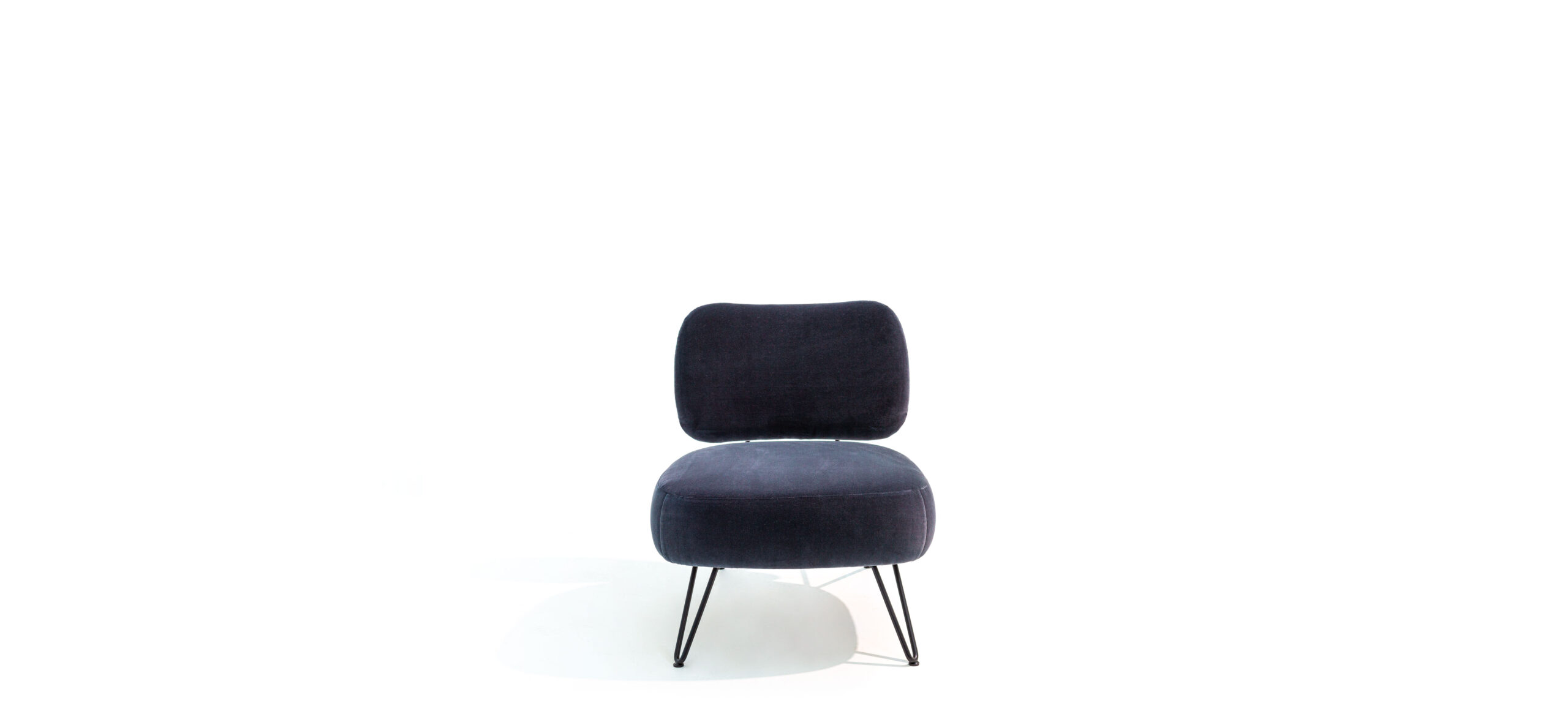 “Overdyed armchair by Moroso – contemporary Italian designer chair with vibrant upholstery and sleek modern design”