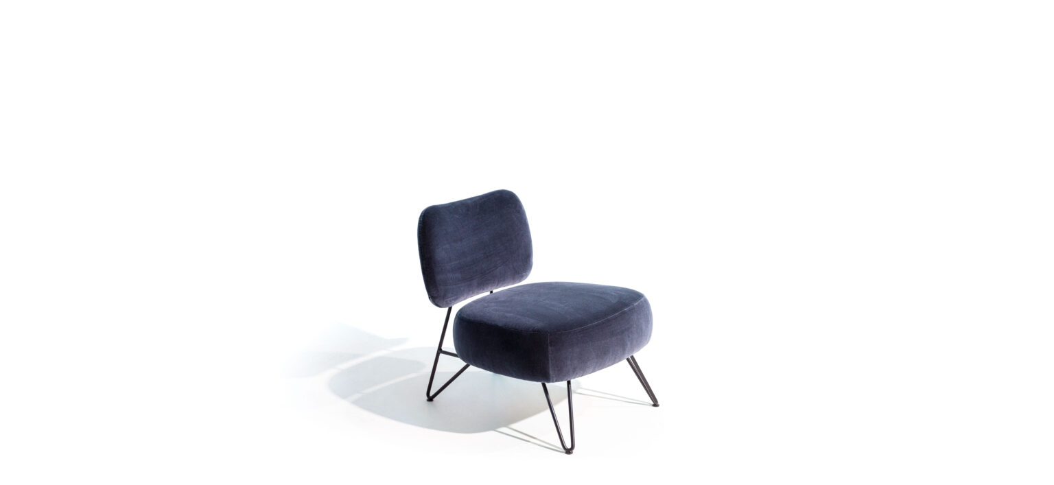 “Modern Overdyed armchair by Moroso – stylish lounge chair featuring bold colors and elegant silhouette”