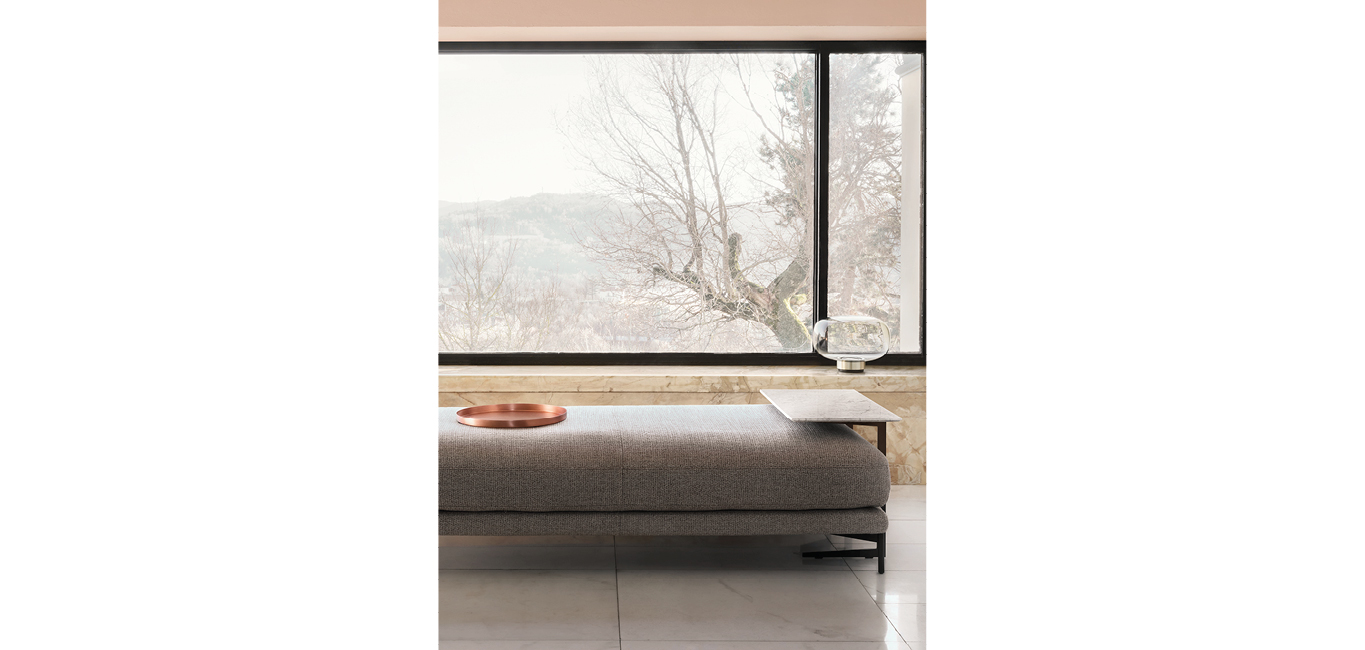 Plane side table by Nicoline Italia featuring a rectangular White Carrara marble top with a Gunmetal metal base, designed to slide under sofas.