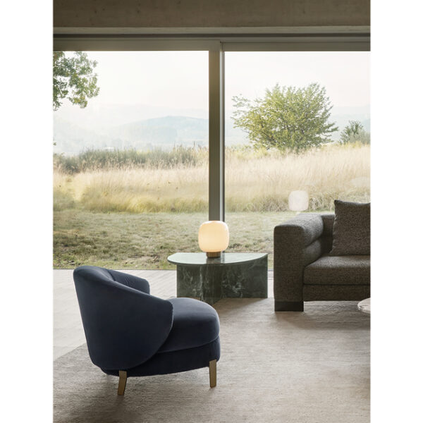 Proust armchair by Nicoline, featuring a plush, sculptural design with contrasting upholstery, perfect for modern interiors in Royal Oak, Michigan.
