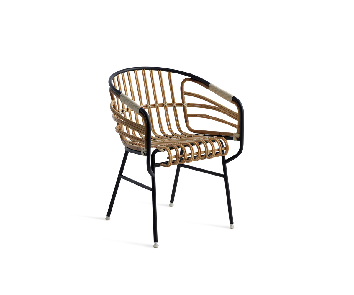 "Raphia Rattan Chair by Casamania featuring handwoven natural rattan seat and black metal frame."