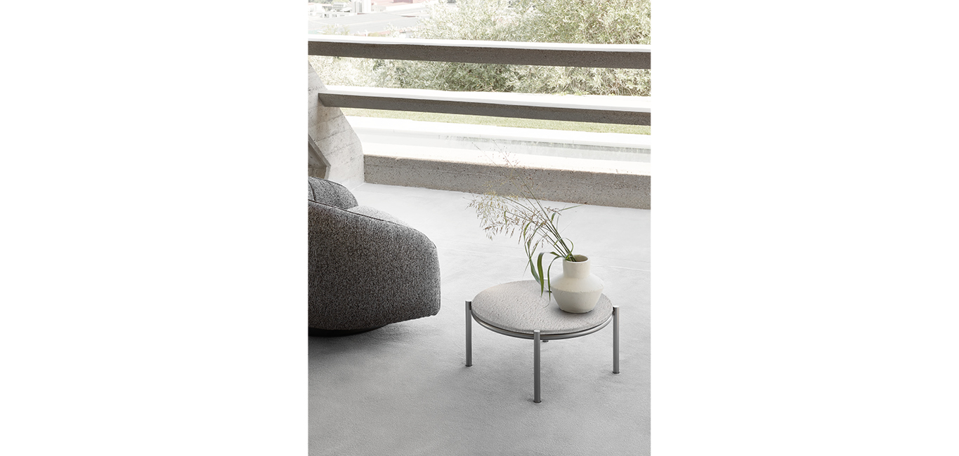 Renoir coffee table by Nicoline Italia featuring a square Sahara Noir marble top with a Lead Grey metal base, showcasing a minimalist design.