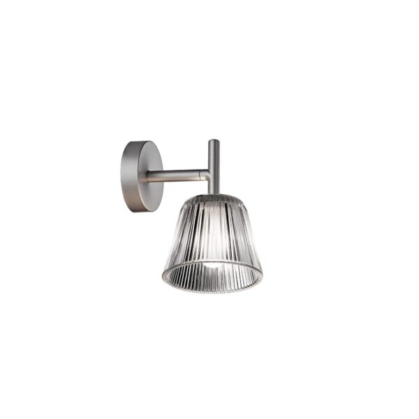 A contemporary Flos Romeo Babe Wall lamp with a [specify outer shade: "pleated fabric" or "clear glass"] shade, and an internal acid-etched glass diffuser, providing soft, diffused light.