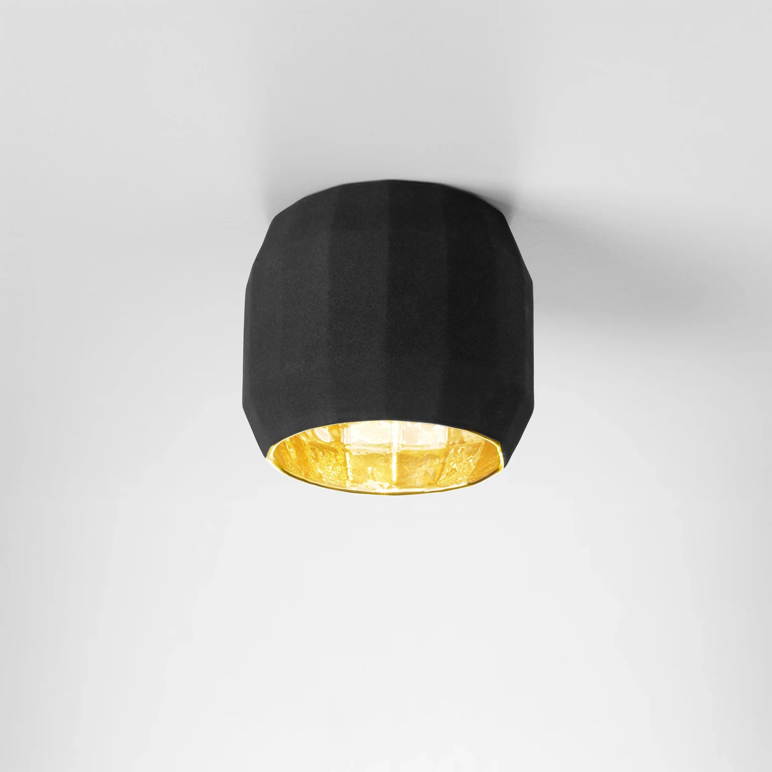 “Scotch Club by Marset ceramic pendant light – modern faceted design with warm inner glow”