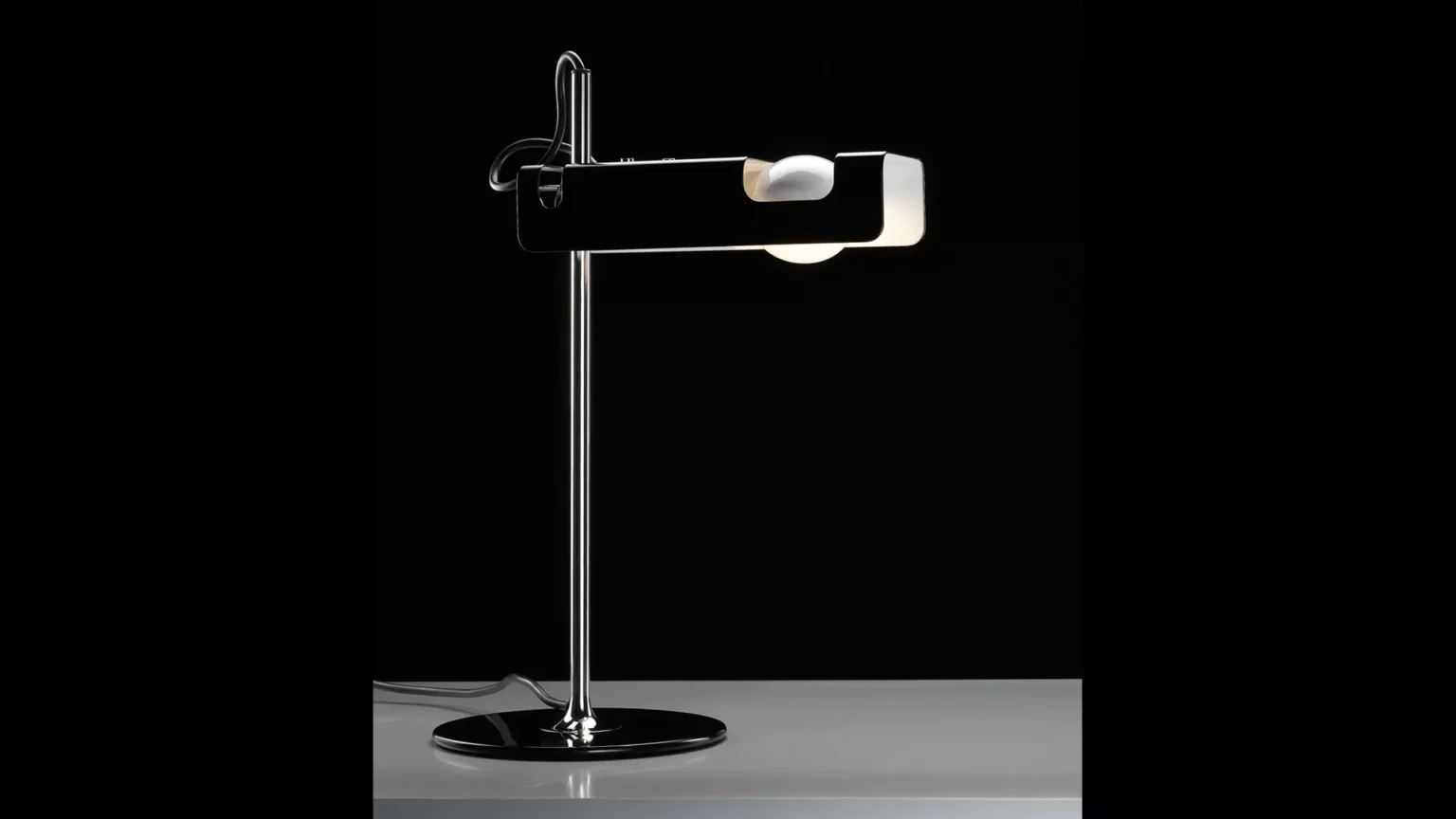 “Spider by Oluce designer lighting – contemporary lamp with swivel shade and minimalist chrome base”